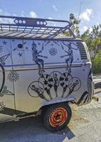 Playa del Carmen Quintana Roo Mexico 2022 Old black broken dirty VW bus Volkswagen car rusting Mexico. photo