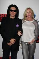 LOS ANGELES, OCT 2 -  Gene Simmons, Shannon Tweed at the Machete Kills Los Angeles Premiere at Regal 14 Theaters on October 2, 2013 in Los Angeles, CA photo