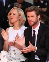 LOS ANGELES, OCT 31 -  Jennifer Lawrence, Liam Hemsworth, guests at the Hunger Games Handprint and Footprint Ceremony at the TCL Chinese Theater on October 31, 2015 in Los Angeles, CA photo