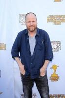 Los Ángeles, 26 de junio: Joss Wheden llega a la 39ª entrega anual de los premios Saturn en The Castaways el 26 de junio de 2013 en Burbank, CA. foto