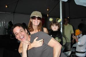 LOS ANGELES, OCT 1 -  Christian LeBlanc, Michelle Staffrod and Daughter arriving at the Light The Night Hollywood Walk 2011 at the Sunset Gower Studios on October 1, 2011 in Los Angeles, CA photo