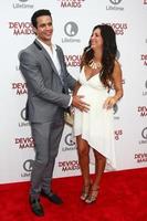 LOS ANGELES, JUN 17 - Matt Cedeno, Erica Franco arrives at the Devious Maids  Lifetime s Original Series Premiere at the Bel-Air Bay Club on June 17, 2013 in Pacific Palisades, CA photo