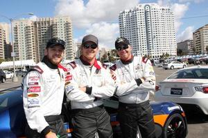 LOS ANGELES, APR 1 - Max Thieriot, Cole Hauser, Brett Davern at the Toyota Grand Prix of Long Beach Pro Celebrity Race Press Day at Long Beach Grand Prix Raceway on April 1, 2014 in Long Beach, CA photo