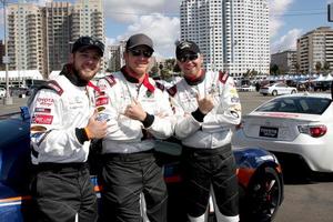 LOS ANGELES, APR 1 - Max Thieriot, Cole Hauser, Brett Davern at the Toyota Grand Prix of Long Beach Pro Celebrity Race Press Day at Long Beach Grand Prix Raceway on April 1, 2014 in Long Beach, CA photo