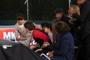 LOS ANGELES, JAN 26 - Justin Bieber meeting Jackson Family at the Michael Jackson Immortalized Handprint and Footprint Ceremony at Graumans Chinese Theater on January 26, 2012 in Los Angeles, CA photo