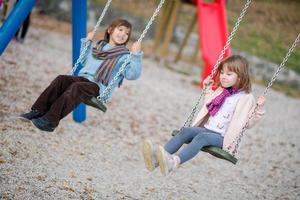 kids swing in the park photo