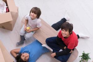 boys with cardboard boxes around them top view photo