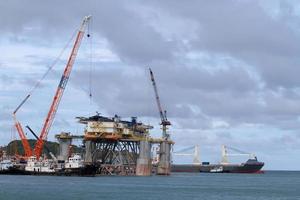 ship for repairs in large floating dry dock photo