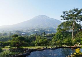 Beautiful view of fish pond and mountain in Central Java, Indonesia photo
