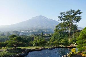 Beautiful view of fish pond and mountain in Central Java, Indonesia photo