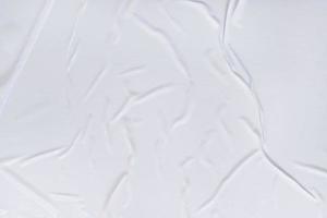 Blank paper crumpled texture and creased paper poster background. Wet crumpled paper texture backgrounds for various purposes. Realistic posters Paper crumpled texture background. photo