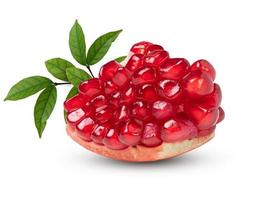 Ripe pomegranate Piece with leaves on the white background. with clipping path. photo