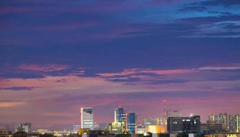 The colorful sky at sunset during twilight after the rain, gives a dramatic feeling, a bird-eye view of the city at twilight, a beautiful sky with clouds,Sky background with clouds,Nature abstract. photo