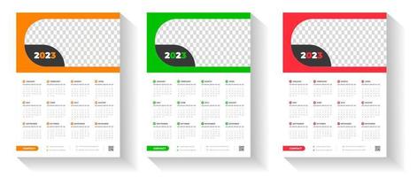 2023 wall calendar design template  with red, green and orange color vector