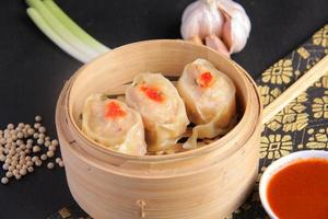 Chicken Dim Sum with Delicious Sauce, Tasty and Juicy Chinese Food photo