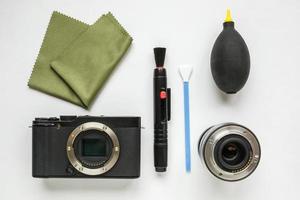 professional tools for digital APS-C dirty camera matrix sensor cleaning on white background photo