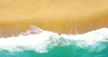 Aerial view of sea and sand beach . Beautiful top view of sand beach. Perfect for holiday summer background, Tropical destination. Phuket beach sea sand video