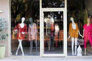 Tel Aviv Israel May 12, 2021. A mannequin stands on a window display in a store. photo