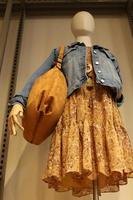 Tel Aviv Israel May 12, 2021. A mannequin stands on a window display in a store. photo