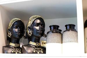 Tel Aviv Israel May 12, 2021. A mannequin stands on a window display in a store. photo
