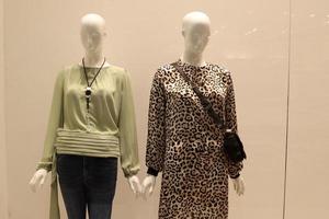 Tel Aviv Israel May 12, 2021. A mannequin stands on a window display in a store. photo