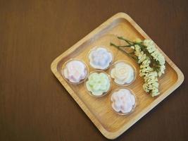 jelly desserts with a set of tea on the table. photo