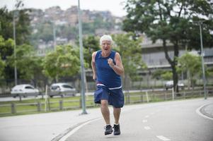 Senior runner on street photo