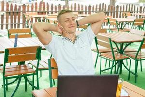 Young man in headphones photo