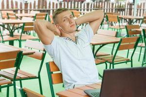 Young man in headphones photo