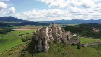 Aerial view - orbiting castle Spissky hrad