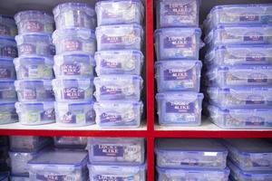 Plastic houseware products on the supermarket Shelf photo