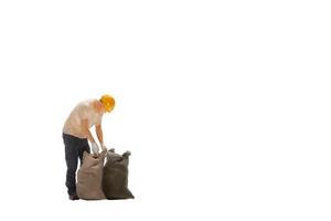 Miniature worker isolated on white background with clipping path photo