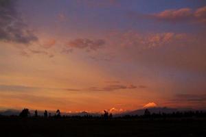 evening in the andes of Ecuador with vulcano Mt. Cotopaxi photo