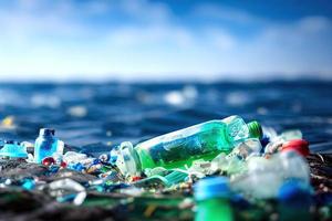 Problem plastic bottles and microplastics floating in the ocean. photo