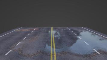 la carretera está mojada por la lluvia, la superficie de la carretera está agrietada y mojada foto