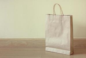 brown paper bag on the floor photo