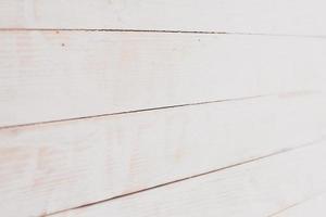 Vintage colored wood background texture with knots and nail holes. Old painted wood wall. Wooden dark horizontal boards. Front view with copy space. photo