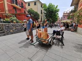 MONTEROSSO AL MARE, ITALY - JUNE, 8 2019 - Pictoresque village of cinque terre italy is full of tourist photo