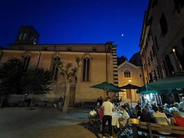MONTEROSSO AL MARE, ITALY - JUNE, 8 2019 - Pictoresque village of cinque terre italy is full of tourist at night photo