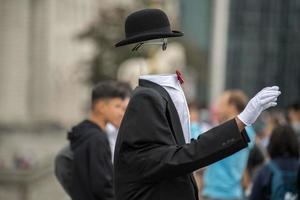 Invisible man in town street photo