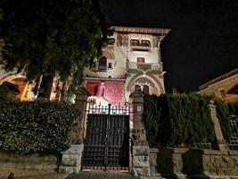 ROME, ITALY - JUNE 14 2019 - Coppede unusual style architechture district in roma buildings at night art nouveau liberty photo