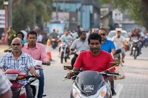 MALE, MALDIVES - FEBRUARY, 13 2016 - Heavy traffic in the street before evening pray time photo