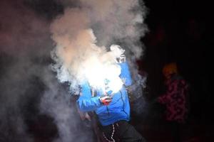 BADIA, ITALY - DECEMBER 31, 2016 - Traditional skiers torchlight procession photo