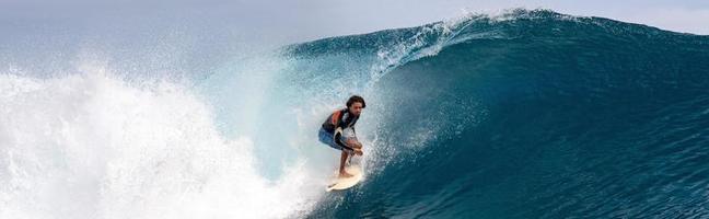 TAHITI, FRENCH POLYNESIA - AUGUST 5 2018 - Surfer training days before Billabong Tahiti Competition at Teahupoo reef photo