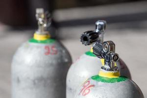 Scuba dive tanks on boat photo