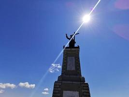 Christ statue on Giarolo Mountain top photo