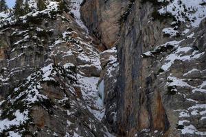 ice on the rock on Fanes mountain dolomites in winter panorama photo