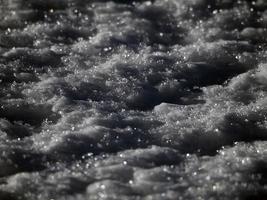 dolomites frozen snow detail on mountain photo