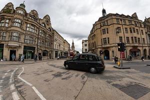 OXFORD, ENGLAND - JULY 15 2017 - Tourists in University town one of most visited in the world photo