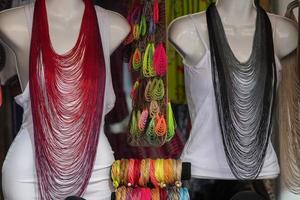 long woman necklaces in a shop photo